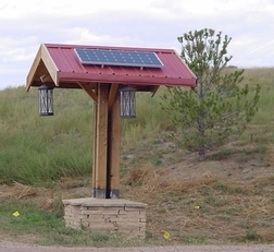 Solar powered street sign lighting