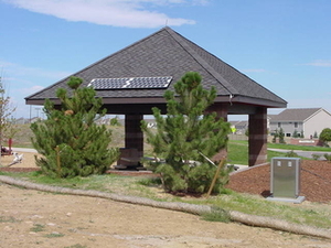 Solar powered pavilion lighting and landscape irrigation system